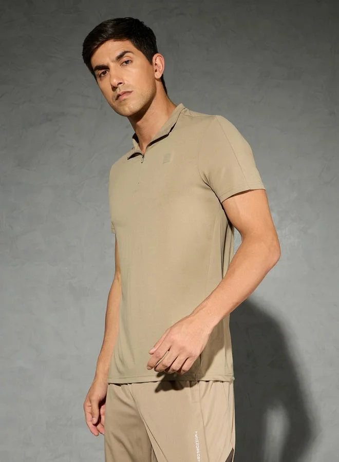 تكنوسبورت تيشيرت بولو تكنوسبورت بأكمام قصيرة مطاطية بلون سادة